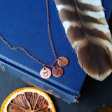 necklace with three zodiac charms, taurus, sagittarius, gemini